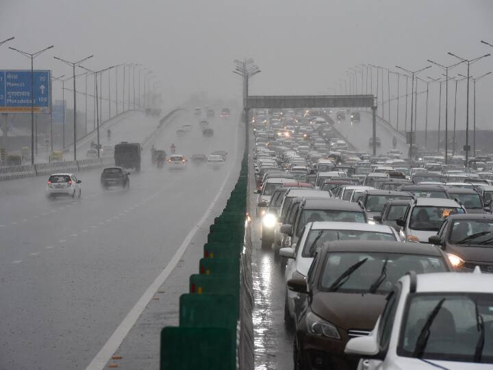 Heavy traffic due to waterlogged roads was witnessed in different parts of Delhi while commuters were trying to may their way to work.(PTI Photo)