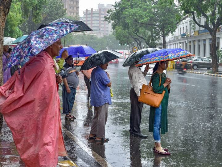 Delhi Monsoon Weather update today rainfall IMD alert for next one week ANN Delhi Rain: दिल्ली में झमाझम बारिश के बाद गिरा पारा, एक हफ्ते तक जारी हुआ अलर्ट