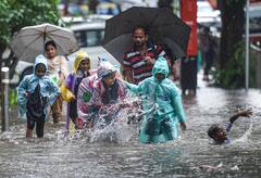 IN PICS | Heavy Rains Inundate Mumbai, Normal Life Hit As Road & Rail Traffic Get Affected