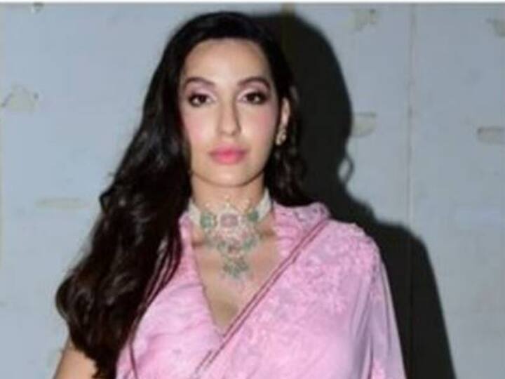 Nora Fatehi Trolled For Making A Guard Hold Her Saree In Heavy Rain Nora Fatehi Trolled For Making A Guard Hold Her Saree In Heavy Rain