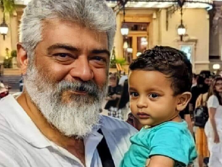 Ajith kumar latest pics from his UK trip goes viral Ajith kumar : முகத்துல அதே ஸ்மைல்.. கையில் க்யூட்டான குட்டி ரசிகர்.. அஜித்தின் லேட்டஸ்ட் வைரல் போட்டோ!