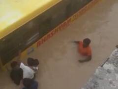 School Bus Carrying 30 Children Gets Submerged In Waterlogged Underpass In Telangana | WATCH