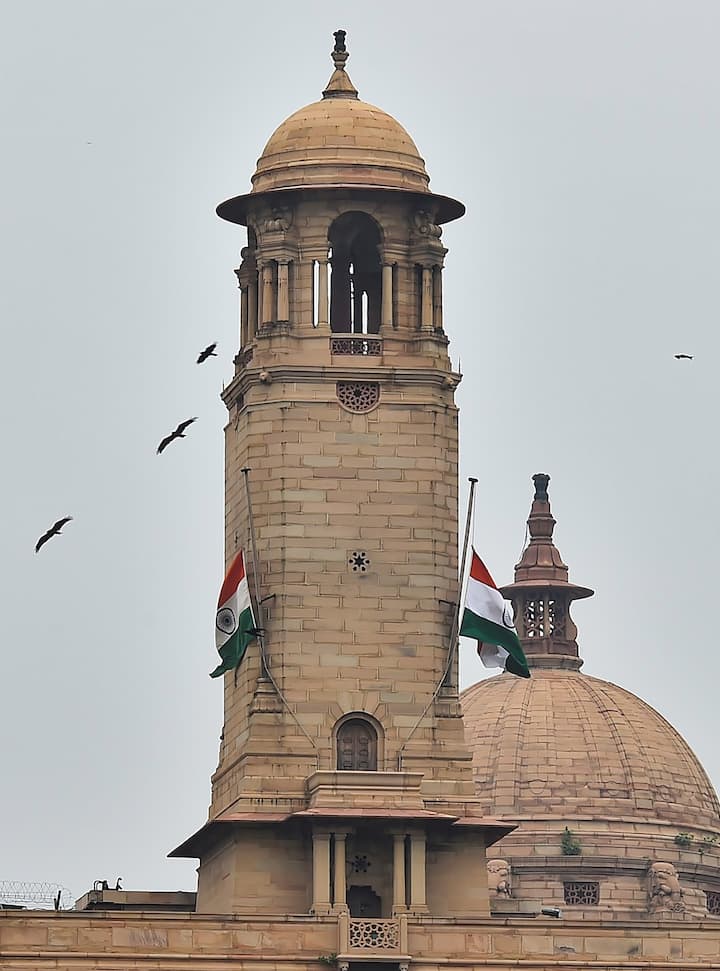 Indian national flag is flown half-mast at a North Block building to mourn the death of former Japanese Prime Minister Shinzo Abe, in New Delhi, Saturday, July 9, 2022. Former Japan PM Shinzo Abe was shot dead during an election campaign in western Japanese city of Nara on Friday. Image Source: PTI