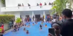Viral Video: গা ঢাকা দিয়েছেন প্রেসিডেন্ট, খালি পড়ে বাসভবন, সুইমিং পুলে আহ্লাদ প্রতিবাদীদের