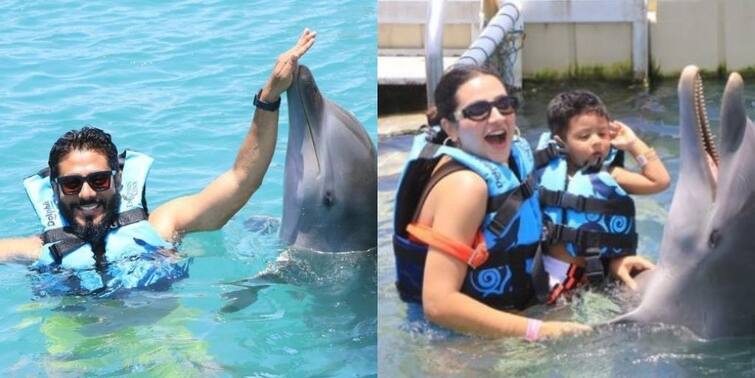 Raj Chakrabarty shared pictures with dolphin from jamaica Subhashree Ganguly and Yuvaan join him Raj Chakrabarty: ডলফিনের সঙ্গে জলকেলিতে মাতলেন রাজ, সঙ্গী শুভশ্রী-ইউভান