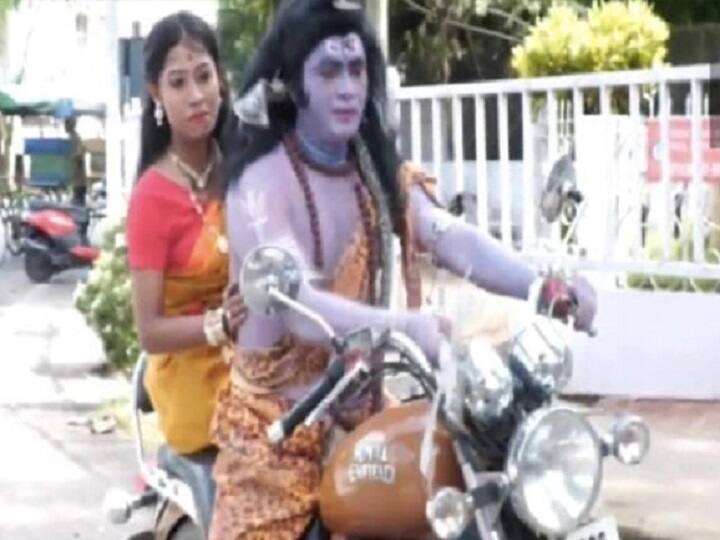 Assam Man Dresses Up As Lord Shiva In Street Play On Price Rise Detained சிவனைப் போல வேடமிட்டு மத்திய அரசுக்கு எதிராக தெருக்கூத்து! கைது செய்த போலீசார்!