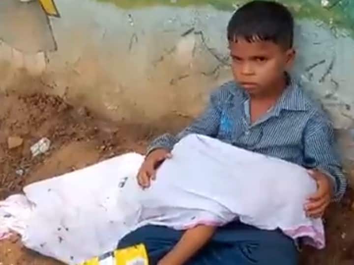 MP: Viral Video Shows 8-Year-Old Sitting With Corpse Of 2-Year-Old Brother In Morena, Sparks Outrage MP: Viral Video Shows 8-Year-Old Sitting With Corpse Of 2-Year-Old Brother In Morena, Sparks Outrage