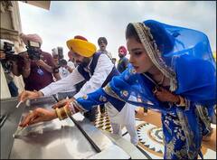 લગ્ન બાદ પત્ની સાથે સુવર્ણ મંદિરે પહોંચ્યા સીએમ ભગવંત માન, જુઓ તસવીરો