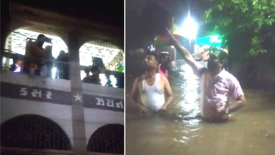 Godhara : કેડસમા પાણીમાં ચાલીને મામલદાર પહોંચ્યા અસરગ્રસ્તો વચ્ચે, પૂછ્યા ખબર-અંતર