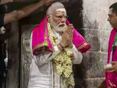 PM Modi Deoghar Visit Photo: झारखंड के देवघर में पीएम मोदी ने किया रोड शो, बाबा बैद्यनाथ के मंदिर में की पूजा