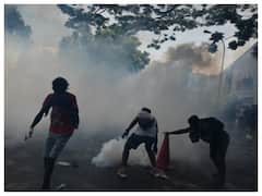 Sri Lanka Crisis: Police Fire Tear Gas As Thousands Of Protesters Storm PM's Office | IN PICS