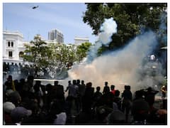 Sri Lanka Crisis: Police Fire Tear Gas As Thousands Of Protesters Storm PM's Office | IN PICS