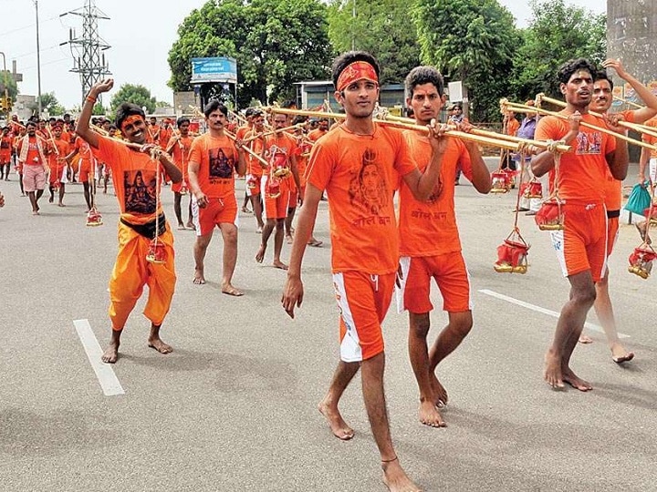 Shravani Mela 2022: देवघर में श्रावणी मेले के पहले ही दिन उमड़ा भक्तों का सैलाब, रास्ते में पैदल चल रहे हैं लाखों कांवड़िए