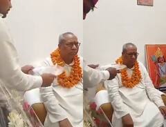 Watch: माला पहनकर बैठे यूपी के मंत्री संजय निषाद, कार्यकर्ता ने उतारी आरती, यहां देखें Video