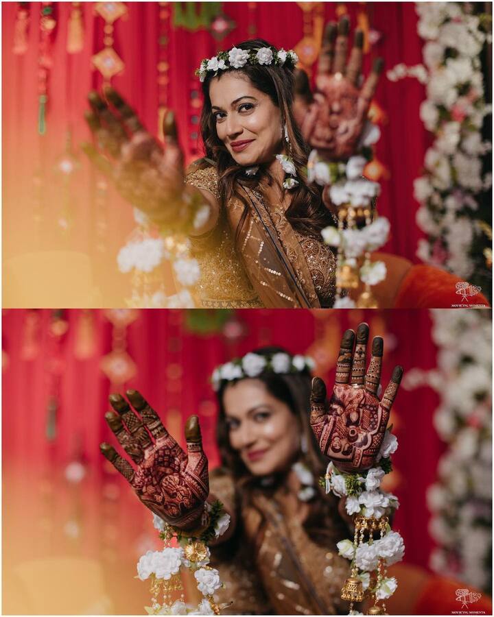 नई-नवेली दुल्हन पायल ने इंस्टाग्राम पर दो तस्वीरें साझा की. इनमें वह मेहंदी लगे हाथ दिखा रही हैं. सिर फ्लोरल टियारा पहने पायल बेहद खुश हैं.