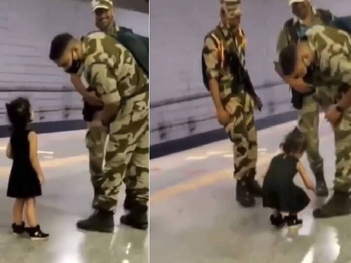 Video of a little girl touching the feet of a jawan leaves netizens emotional online Watch Video : வேகமாக ஓடிச்சென்று ராணுவ வீரரின் காலில் விழுந்து வணங்கிய குழந்தை.. திகைத்த வீரர்.. வைரல் வீடியோ