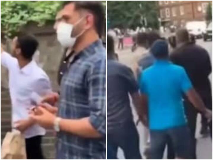 India vs England MS Dhoni Viral Video Dhoni Rescued By Security After Fans Mob Him For Selfies On Streets Of London MS Dhoni Gets Rescued By Security After Fans Mob Him For Selfies On Streets Of London - Watch Video