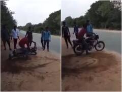 Shocking: सड़क पर बाइक से स्टंट कर रहा था शख्स, अचानक आया ट्रक और उड़ा दिए परखच्चे