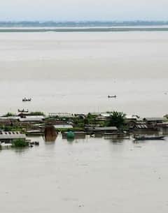 Photo : आसाममधील पूर ही 'गंभीर नैसर्गिक आपत्ती' म्हणून घोषीत
