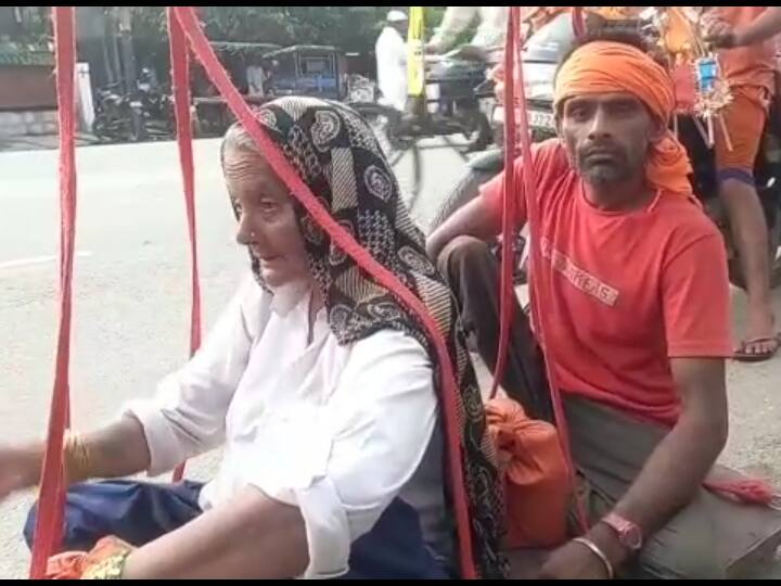 कलयुग के श्रवण कुमार: दिव्यांग भाई, बुजुर्ग मां को कांवड़ में बैठाकर निकले विजय गुज्जर, रोज तय कर रहे 20 किमी का सफर UP News kanwar Yatra Divyang brother Vijay Gujjar came making elderly mother kanwar ANN कलयुग के श्रवण कुमार: दिव्यांग भाई, बुजुर्ग मां को कांवड़ में बैठाकर निकले विजय गुज्जर, रोज तय कर रहे 20 किमी का सफर