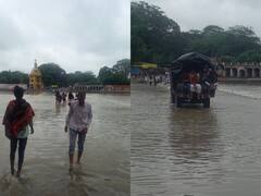 In Pics: मध्य प्रदेश में बारिश ने बढ़ाई मुसीबत, जान हथेली पर रखकर उफनती नदी पार कर रहे लोग, देखिए हैरान कर देने वाली तस्वीरें