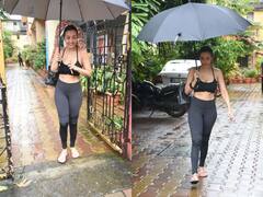 Malaika Arora Photos: भारी बारिश में भी फिटनेस रूटीन मिस नहीं करतीं मलाइका अरोड़ा, छाता लिए एक्ट्रेस पहुंची जिम