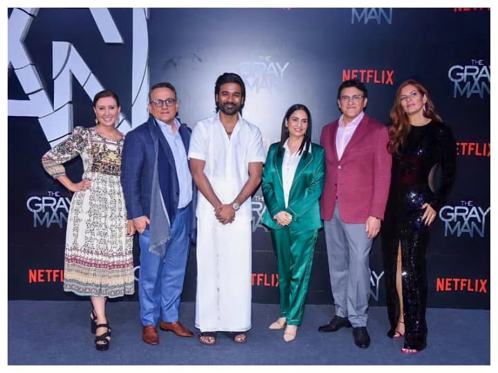 Dhanush Wears Veshti For 'The Gray Man' Mumbai Premiere, Poses