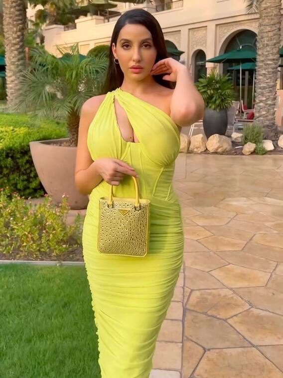 ਨਿਓਨ ਗ੍ਰੀਨ ਡੀਪ ਨੈੱਕ ਡ੍ਰੈੱਸ 'ਚ ਨੌਰਾ ਨੇ ਫਲਾਂਟ ਕੀਤਾ ਆਪਣਾ ਕਰਵੀ ਫਿੱਗਰ