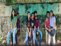 Kerala: బస్‌స్టాప్‌లో అబ్బాయిలు వాళ్ల ఒడిలో అమ్మాయిలు, ఈ వైరల్ ఫోటోల వెనక కథ తెలుసా?