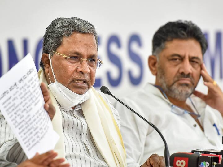 Congress Word war between Shivkumar and siddaramaiah faction for CM post in Karnataka Karnataka में मुख्यमंत्री उम्मीदवारी को लेकर कांग्रेस में दो फाड़, शिवकुमार और सिद्धरमैया में जुबानी जंग तेज