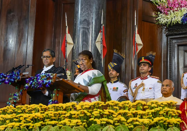 Droupadi Murmu being sworn-in as the 15th President of India by Chief Justice of India Justice NV Ramana in the Central Hall of Parliament.  Murmu commenced her journey in the field of politics in 1997 by joining the Bharatiya Janata Party (BJP). Image Source: PTI