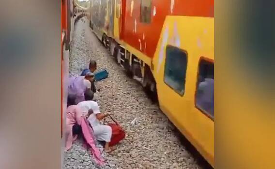 Viral Video: Viral Video: ਦੋਵੇਂ ਪਾਸੇ ਟਰੇਨ, ਵਿਚਾਲੇ ਫਸ ਗਈ ਜ਼ਿੰਦਗੀ, ਭੁੱਲ ਕੇ ਵੀ ਨਾ ਕਰੋ ਅਜਿਹੀ ਗਲਤੀ, ਫੈਸਲਾ ਤੁਹਾਡਾ, ਜ਼ਿੰਦਗੀ ਤੁਹਾਡੀ Viral Video: Viral Video: ਦੋਵੇਂ ਪਾਸੇ ਟਰੇਨ, ਵਿਚਾਲੇ ਫਸ ਗਈ ਜ਼ਿੰਦਗੀ, ਭੁੱਲ ਕੇ ਵੀ ਨਾ ਕਰੋ ਅਜਿਹੀ ਗਲਤੀ, ਫੈਸਲਾ ਤੁਹਾਡਾ, ਜ਼ਿੰਦਗੀ ਤੁਹਾਡੀ