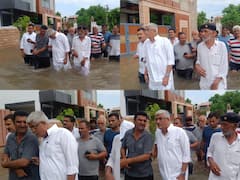 In Pics: जोधपुर में बाढ़ प्रभावित इलाके में पहुंचे केंद्रीय मंत्री गजेंद्र सिंह शेखावत, पानी में उतरकर जानी लोगों की समस्या