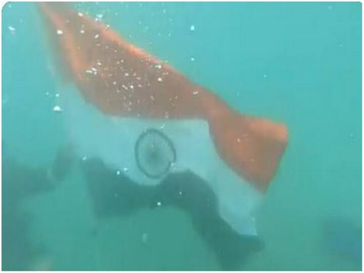 The Indian Coast Guard unfurls the flag under the ‘Har Ghar Tiranga’ campaign under the sea