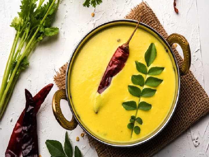 Rajasthani Tadka Besan Kadhi, Rajasthani Kadhi with Bajra Roti Rice Recipe Rajasthani Kadhi: बेसन की कढ़ी में लगाएं राजस्थानी तड़का, कढ़ी का स्वाद किसी जलसे से कम नहीं होगा