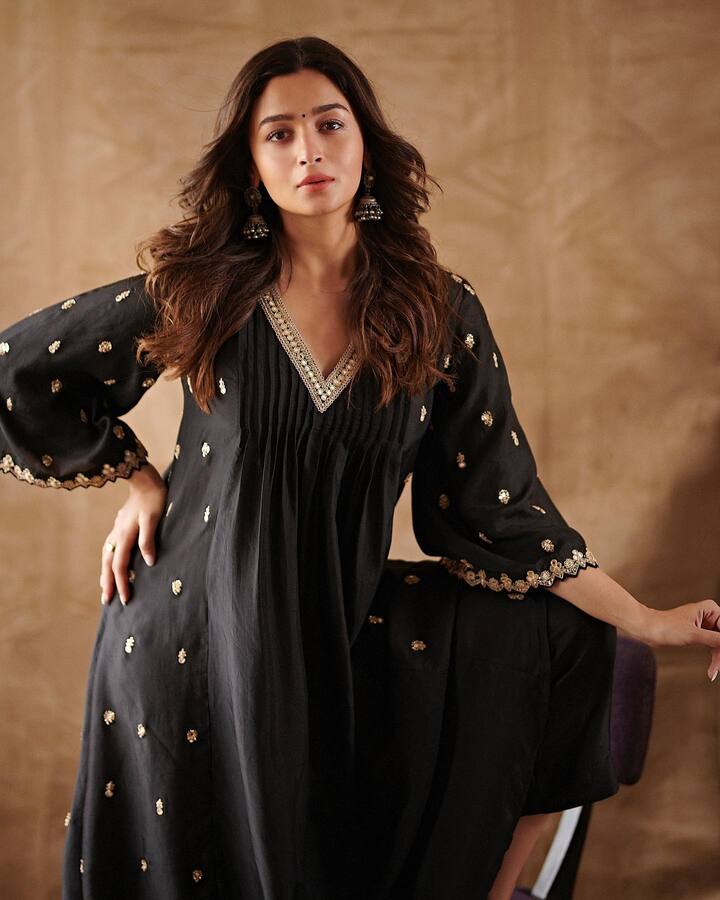 In her recent post, the mother-to-be glowed in a black Anarkali set. Her outfit came from the racks of Punil Balana.