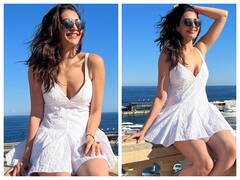 Karishma Tanna Pics: डीप नेक व्हाइट शॉर्ट ड्रेस में गजब के पोज़ देती दिखीं करिश्मा तन्ना, ग्लैमरस अदाएं देख आप भी हो सकते हैं फिदा