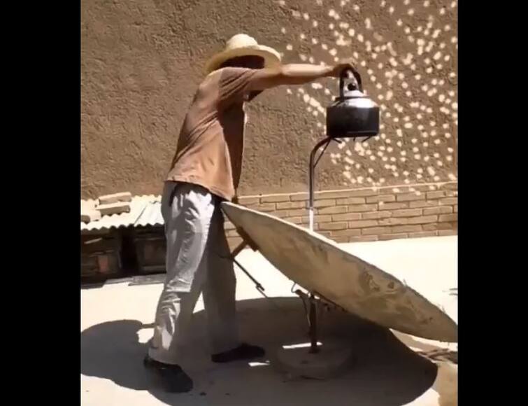 Man Boiling Water With The Help Of Solar Energy Video Viral On Social Media Viral: આ ભાઈને મોંઘવારી ના નડે, પાણી ઉકાળવા માટે અપનાવી આ તરકીબ, જુઓ વીડિયો
