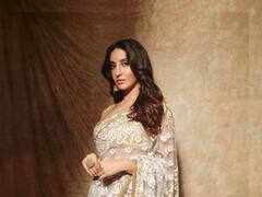 PHOTO : परी म्हणू की सुंदरा... पांढऱ्या साडीत नोरा फतेहीच्या घायाळ करणाऱ्या अदा!