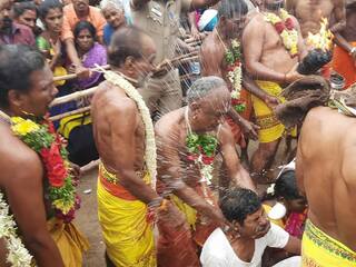 கரூர்: மகாதானபுரம் மகாலட்சுமி கோவிலில்  தலையில் தேங்காய் உடைத்து நேர்த்தி கடனை செலுத்திய பக்தர்கள்..!