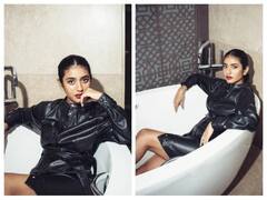 બ્લેક શોર્ટ ડ્રેસ પહેરીને Priya Prakash Varrier એ બાથટબમાં આપ્યા કિલર પોઝ, જુઓ ફોટો