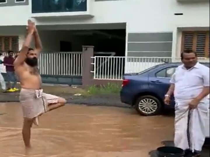 Unique protest in Kerala over bad roads, yoga done in front of MLA in water filled pit