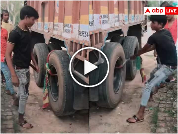 Man Rotate the tire by hand and started the truck engine video viral on social media Viral: शख्स ने हाथ से घुमाया टायर और चालू कर दिया ट्रक, देखिए ये हैरान कर देने वाला वीडियो