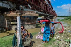 Delhi Yamuna Water Level: दिल्ली में यमुना के पानी ने खतरे के निशान को किया पार, देखें तस्वीरें