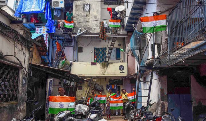 BMC officials distribute national flags as part of 'Har Ghar Tiranga' campaign, ahead of Independence Day in Mumbai (Image Source: PTI)
