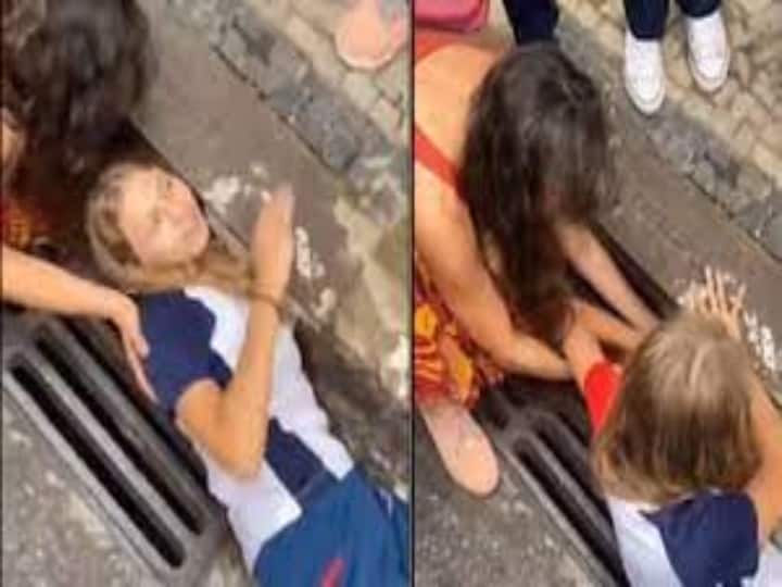 Viral Video Girl saves a kitten stuck in storm drain- Watch Viral Video: பூனைக்குட்டியின் உயிரை காப்பாற்ற சாக்கடையில் கையை விட்ட சிறுமி...! வைரலாகும் வீடியோ..!