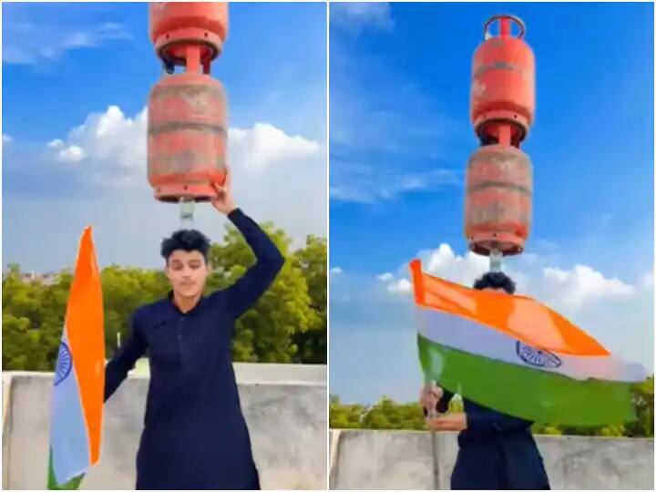 Tricolor In Hands And 2 Heavy Gas Cylinders On Top Of Head Video Viral On Social Media Independence Day: હાથમાં તિરંગો અને માથા ઉપર 2 ગેસ સિલિન્ડર, જુઓ ગજબના સંતુલનનો વીડિયો