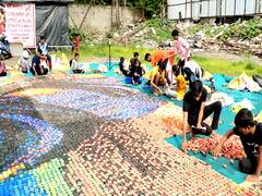 Ganesh Utsav 2022 : 75 हजार दिव्यांनी साकारले 'बाप्पा'