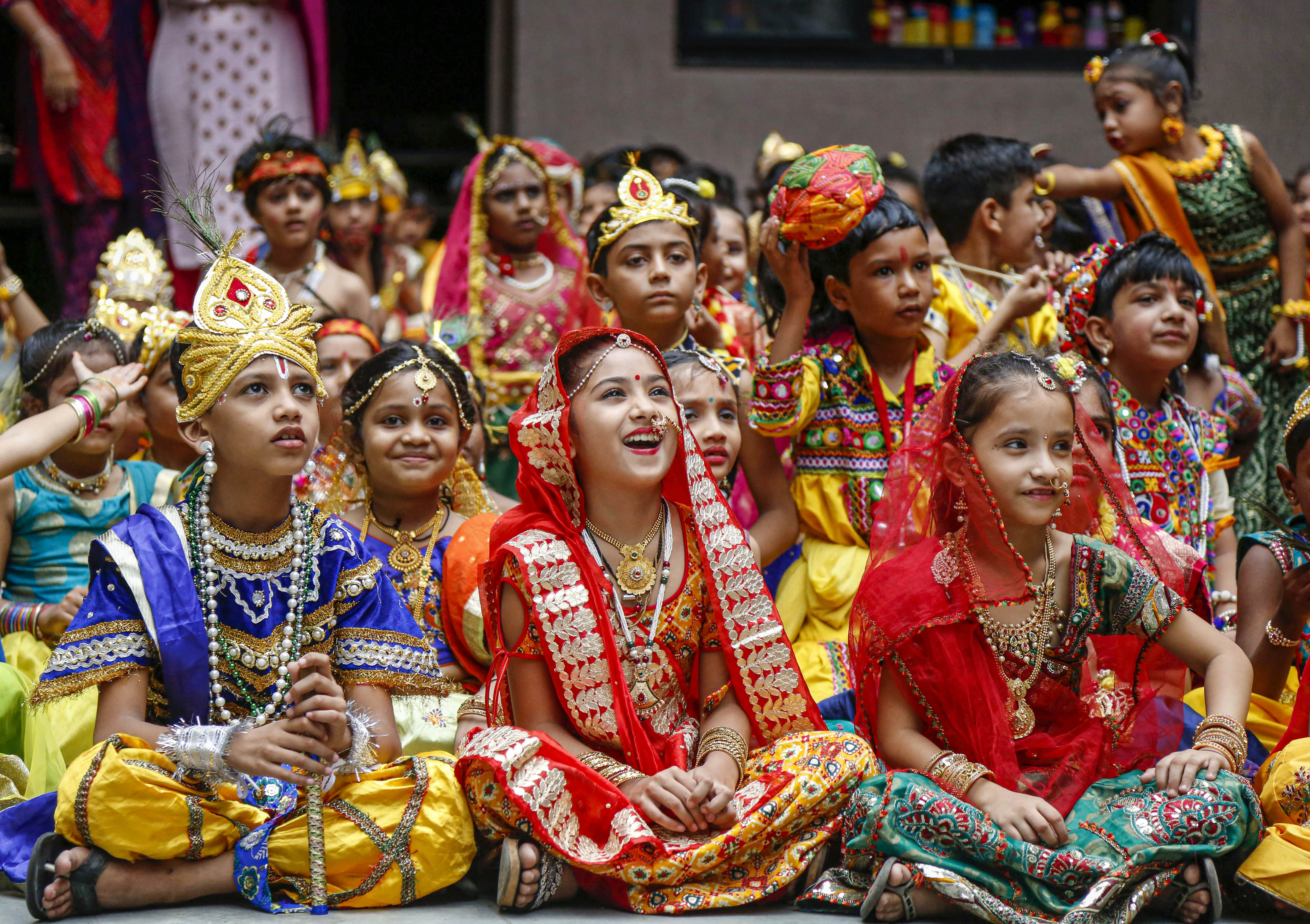 A Cute Little Girl Wearing Radha Dress Standing while Posing at the Camera  · Free Stock Photo