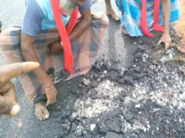 Tiruvannamalai: new tarred road for the hill dwellers Shocking video of hand-carrying TNN Watch video: மலைவாழ் மக்களுக்கு அமைக்கப்பட்ட புதிய தார் சாலை; கையால் பெயர்த்து  எடுக்கும் அதிர்ச்சி வீடியோ